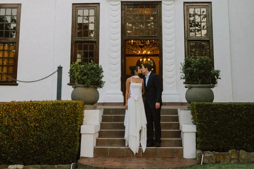 zoe and hilanco on steps - Vredenburg Manor house